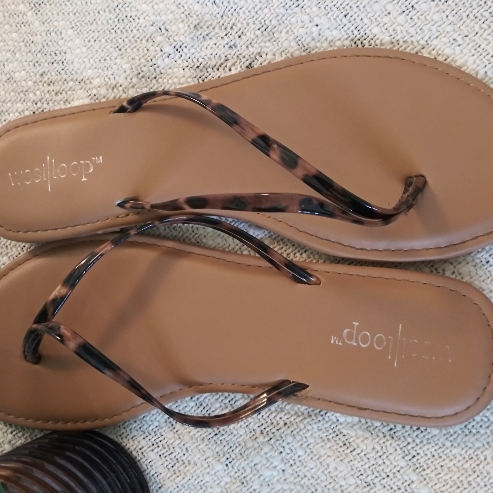 Cheetah print flip flops size 7/8